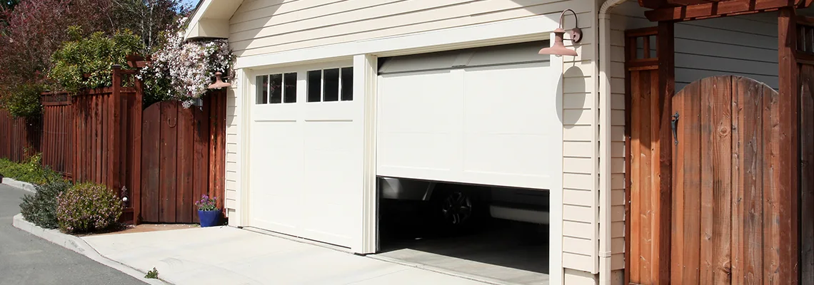 Fix Metal Garage Door Jerking in Zion, Illinois